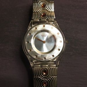 Women’s Swatch watch, stainless/water resistant